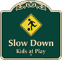 Green Background – Slow Down Kids At Play Sign