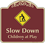 Burgundy Background – Slow Down Children At Play Sign