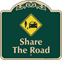 Green Background – Share The Road Sign