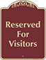 Burgundy Background – Reserved For Visitors Sign