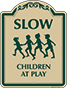Green Border & Text – Slow Children At Play Sign
