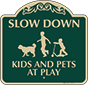Green Background – Slow Down Kids And Pets At Play Sign
