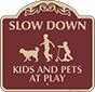 Burgundy Background – Slow Down Kids And Pets At Play Sign