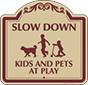 Burgundy Border & Text – Slow Down Kids And Pets At Play Sign