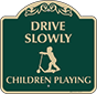 Green Background – Drive Slowly Children Playing Sign