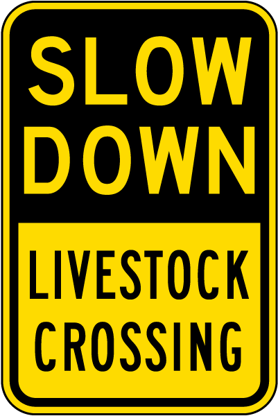 Slow Down Livestock Crossing Sign