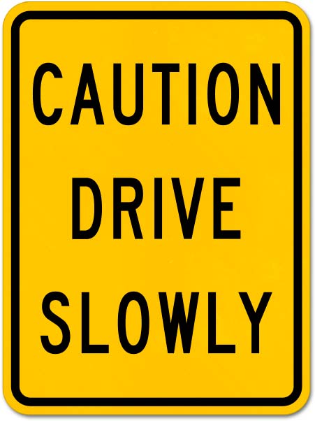 Caution Drive Slowly Sign