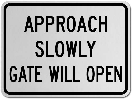 Approach Slowly Gate Will Open Sign