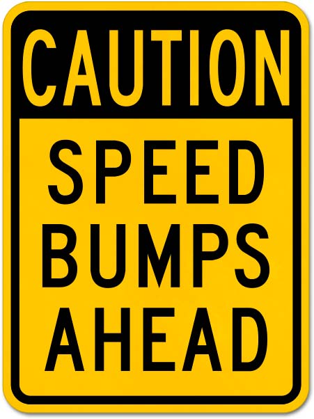 Caution Speed Bumps Ahead Sign