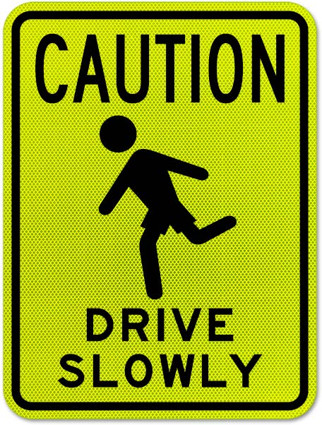 Caution Drive Slowly sign