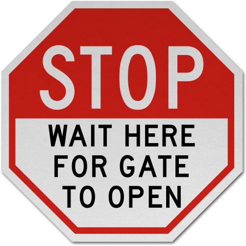 Stop Wait Here For Gate to Open Sign