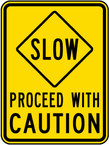 Slow Proceed With Caution Sign
