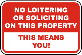 No Loitering or Soliciting Sign
