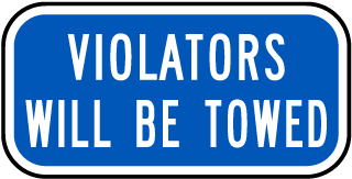 Violators Will Be Towed Sign