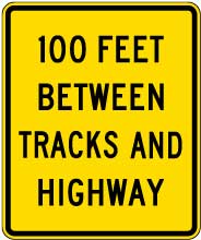 100 Feet Between Tracks and Highway Sign