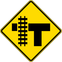 Highway-Light Rail Transit Grade Crossing Left Sign