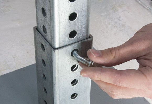 Image showing placement of corner bolt into posts