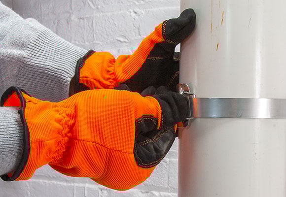 Bend the strapping over the buckle or wing seal to partially secure the strapping